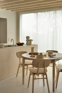 Bok round extendable dining table